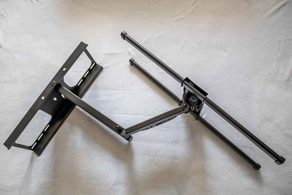 Single arm full motion TV wall mount with the arm extended from the wall plate